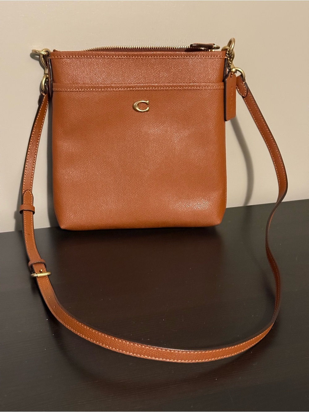 Coach Brown Leather Crossbody Bag with Gold 'C' Accent